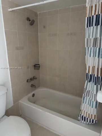 a view of a room and window