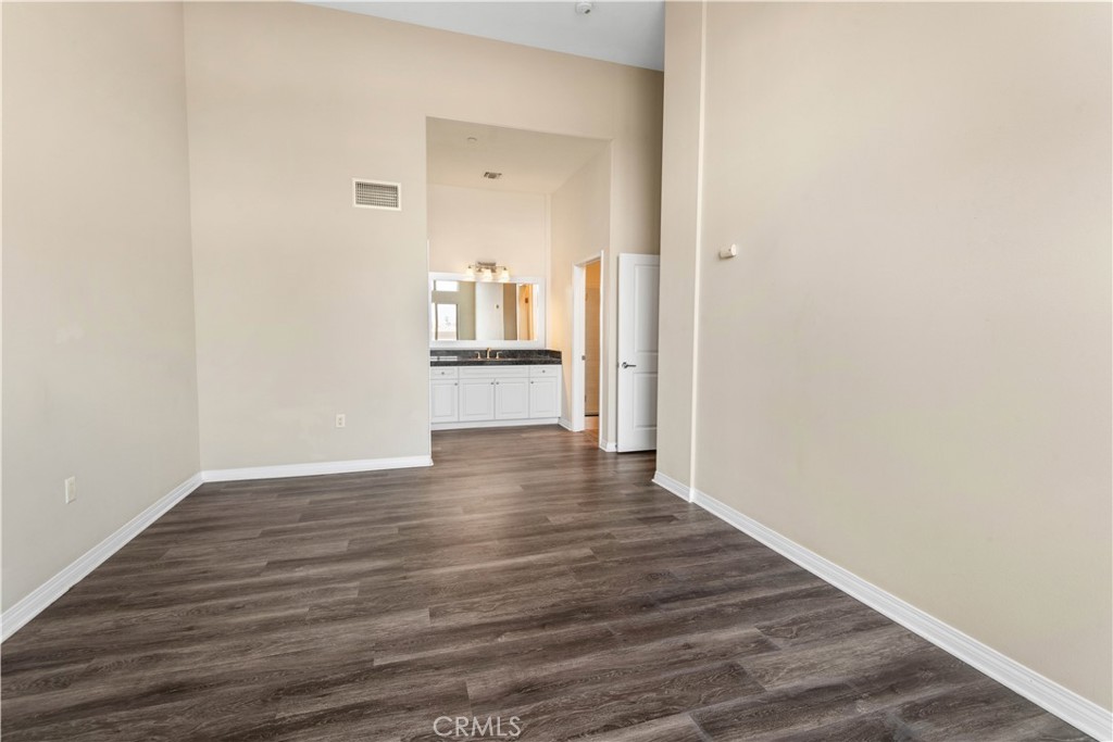 600 North Atlantic Boulevard, Unit 213 Monterey Park, CA 91754 - Photo 14 of 28 a view of wooden floor and windows in a room