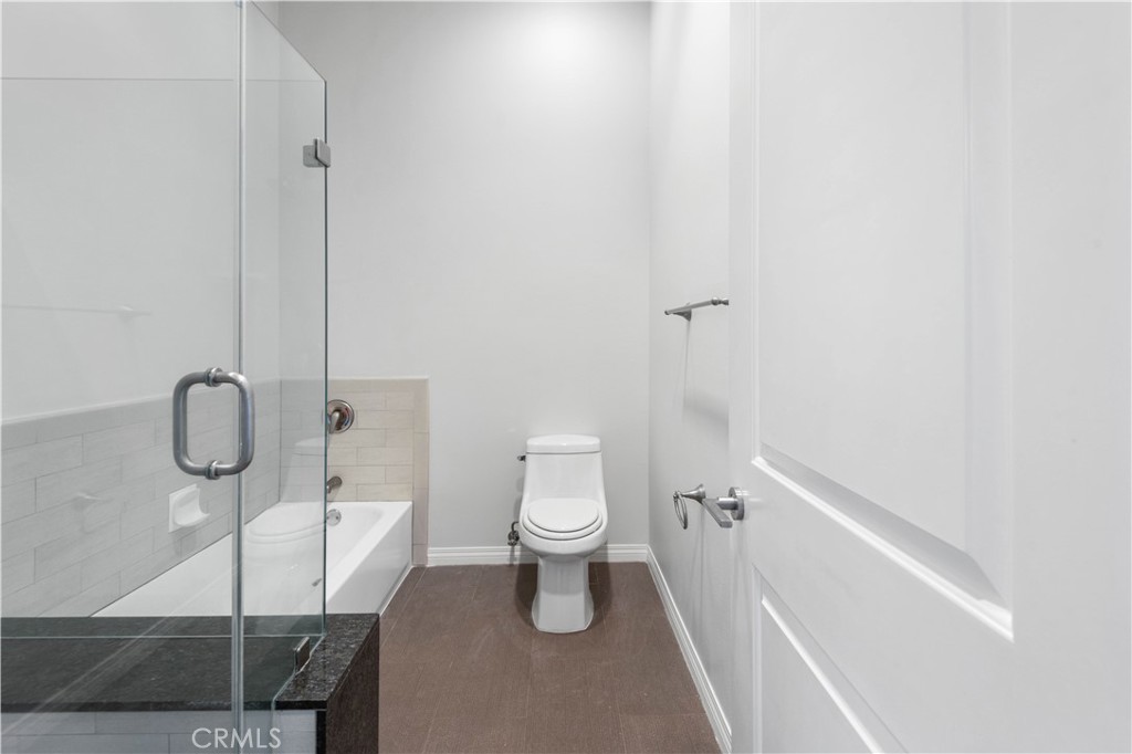 600 North Atlantic Boulevard, Unit 213 Monterey Park, CA 91754 - Photo 16 of 28 a bathroom with a sink a toilet and shower