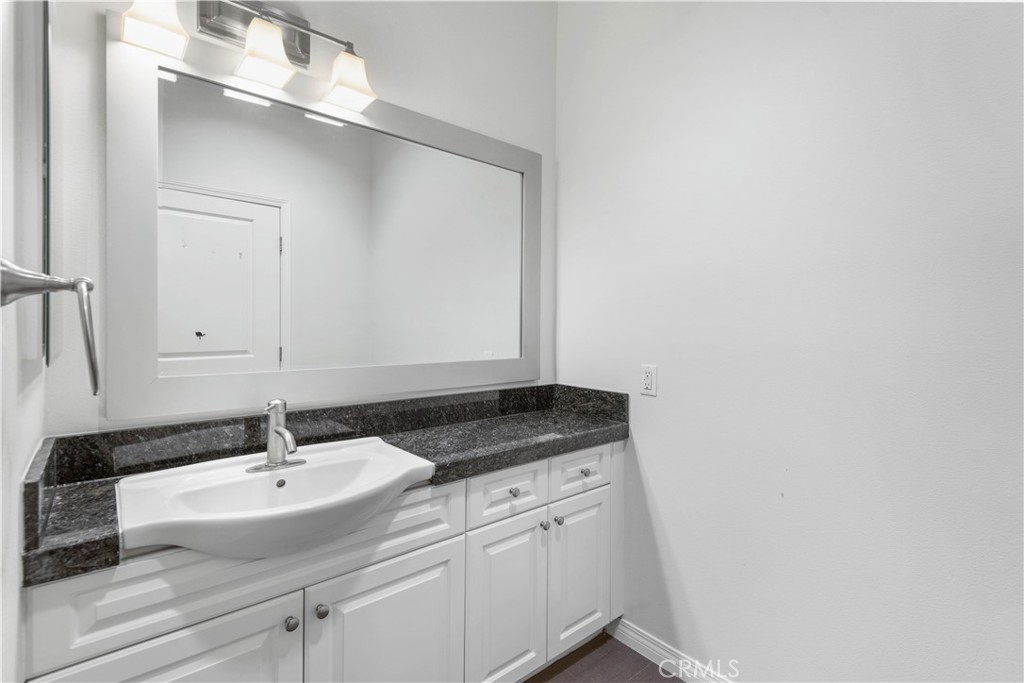 600 North Atlantic Boulevard, Unit 213 Monterey Park, CA 91754 - Photo 8 of 28 a bathroom with a sink and a mirror