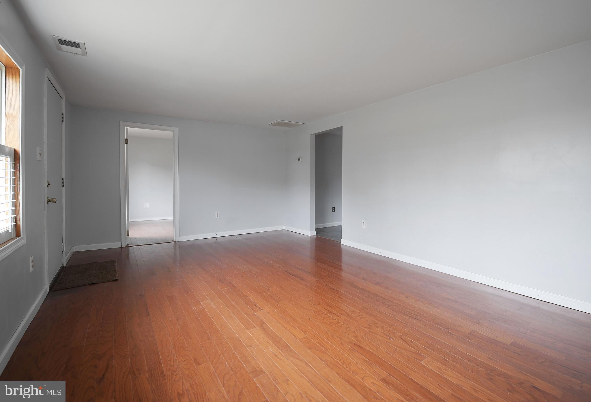 1006 Trimble Road Joppa, MD 21085 - Photo 7 of 31 Living Room Leading to Kitchen and Office/Den