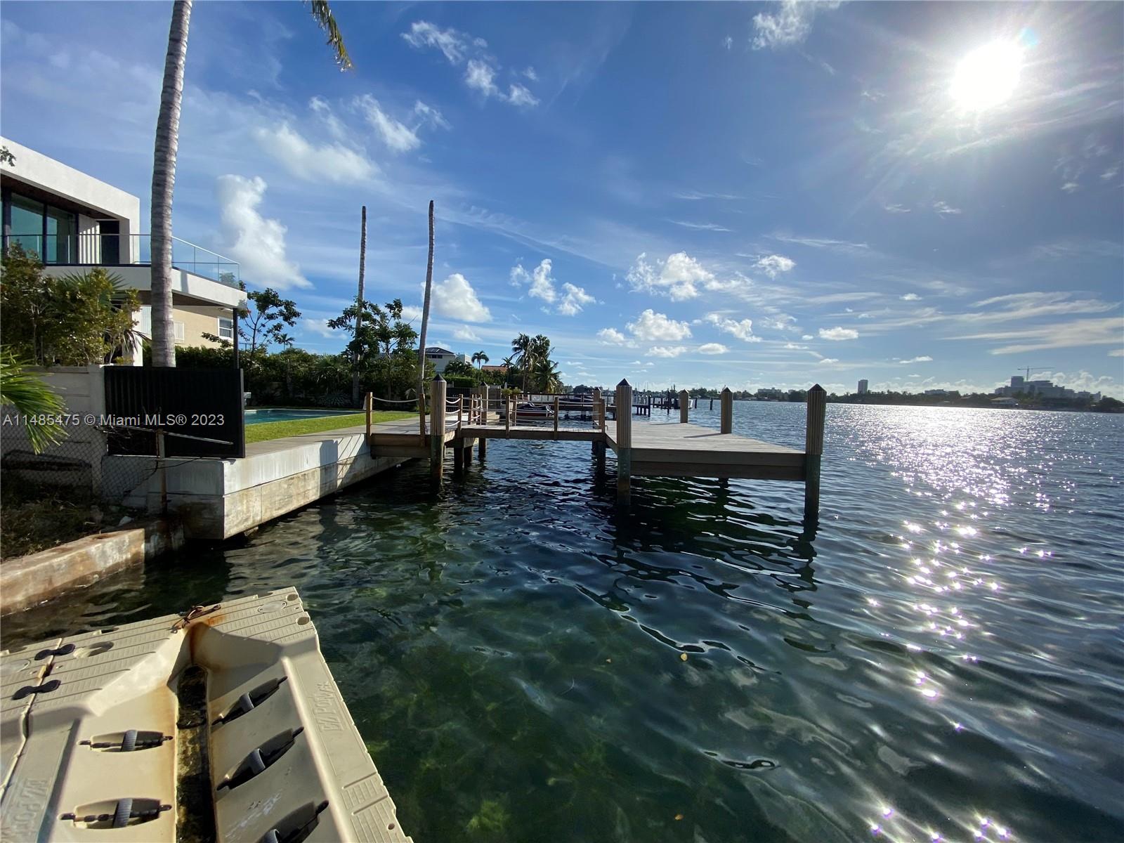 Biscayne Point Miami Beach, FL 33141 - Photo 13 of 20 a view of a patio with chairs and a table
