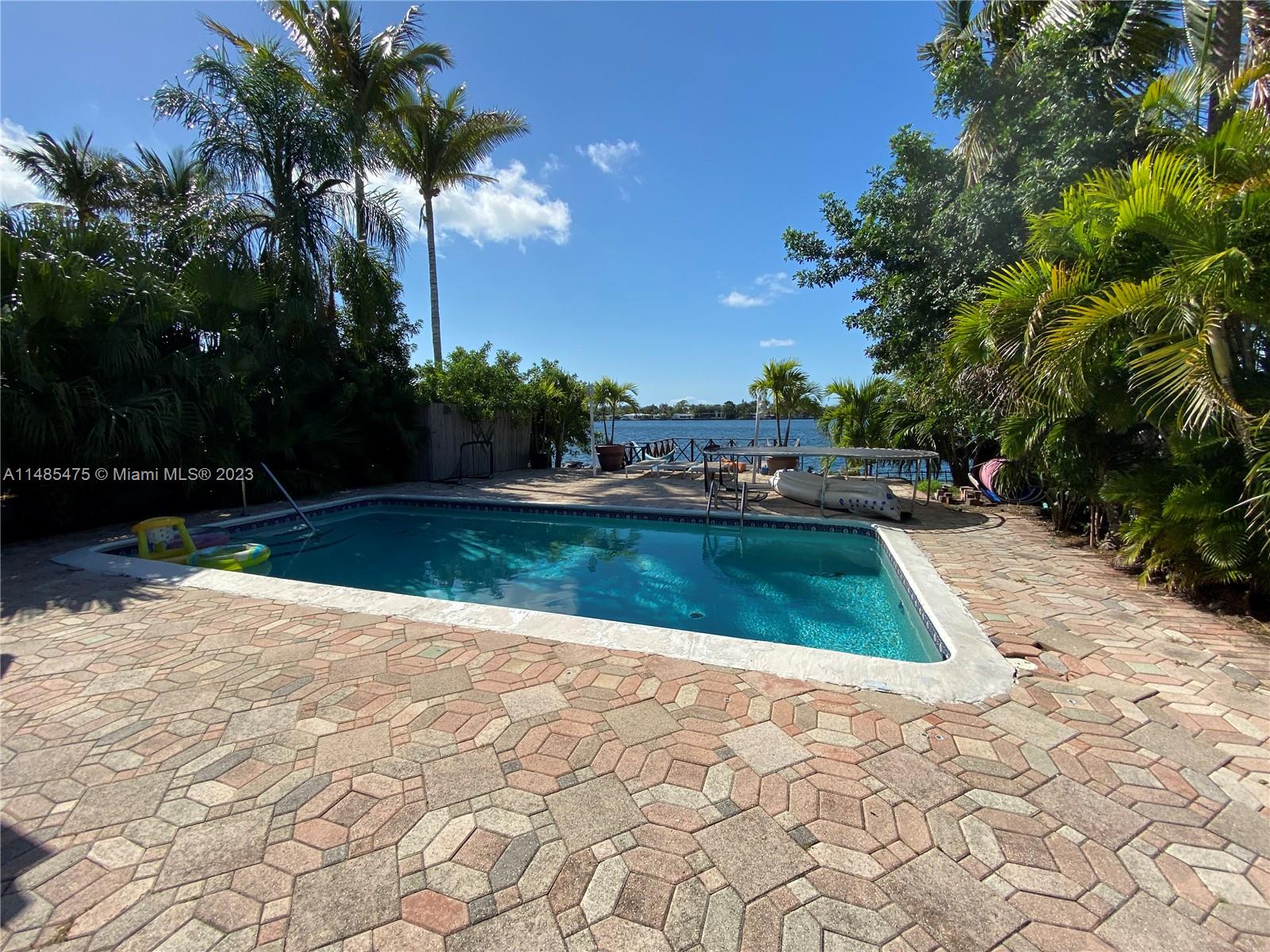 Biscayne Point Miami Beach, FL 33141 - Photo 20 of 20 a view of swimming pool with a yard