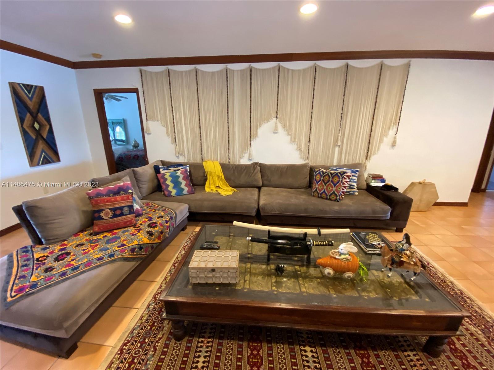 Biscayne Point Miami Beach, FL 33141 - Photo 3 of 20 a living room with furniture and a rug