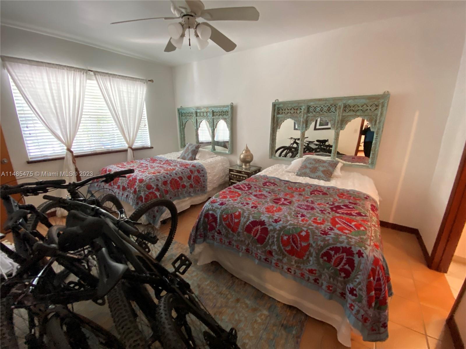 Biscayne Point Miami Beach, FL 33141 - Photo 6 of 20 a bedroom with two beds and a window