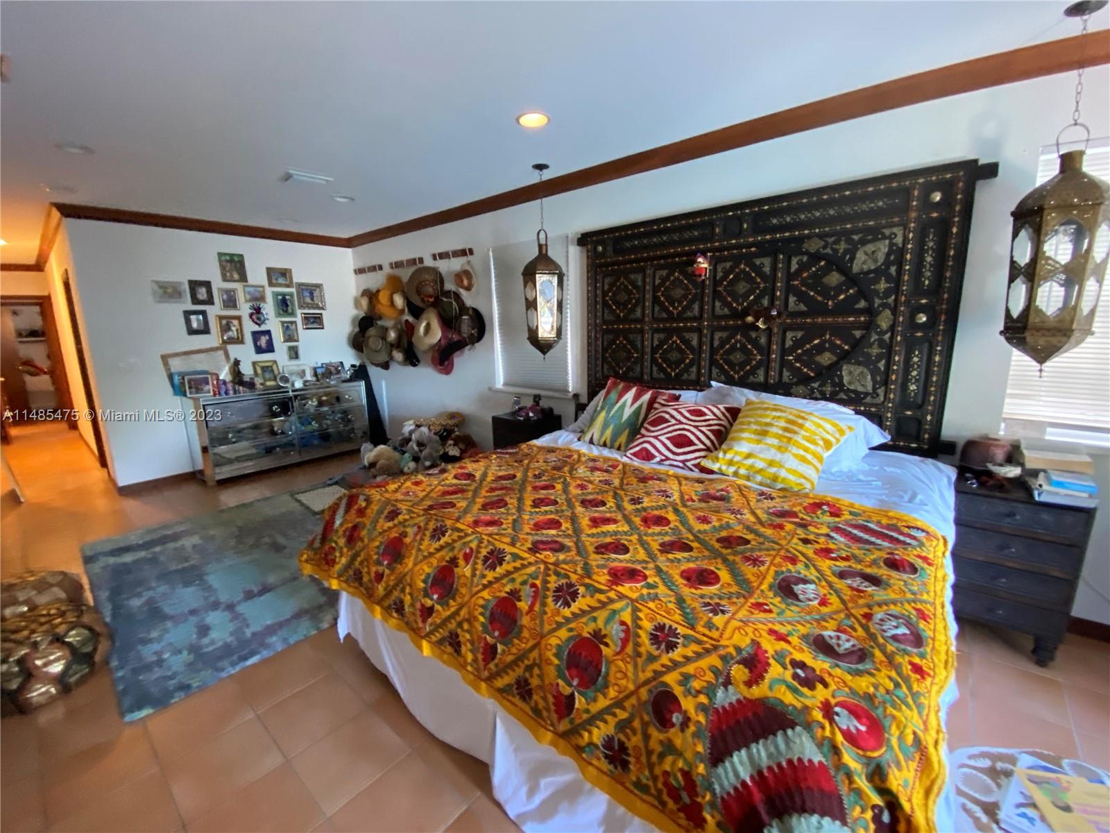 Biscayne Point Miami Beach, FL 33141 - Photo 7 of 20 a bed sitting in a bedroom next to a window