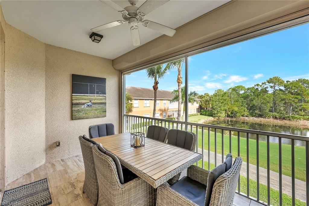 9110 Spanish Moss Way, Unit 422 Bonita Springs, FL 34135 - Photo 18 of 20 a view of a dining room with furniture window and outside view