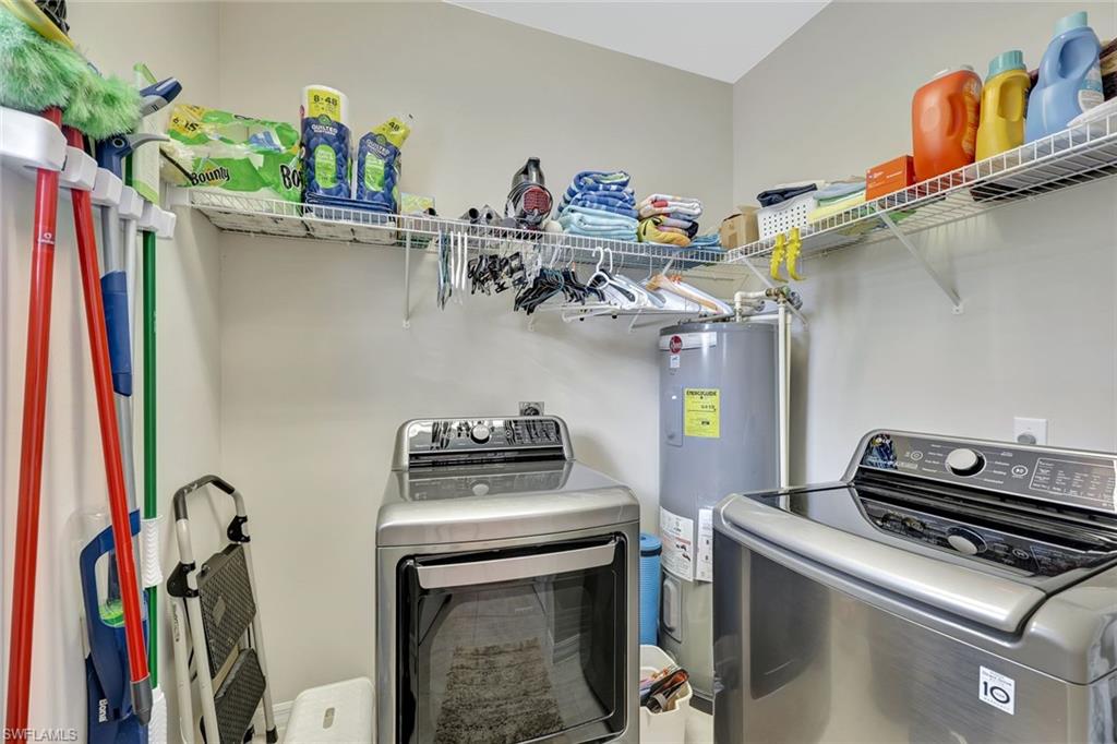 9110 Spanish Moss Way, Unit 422 Bonita Springs, FL 34135 - Photo 20 of 20 a room with storage and utility room