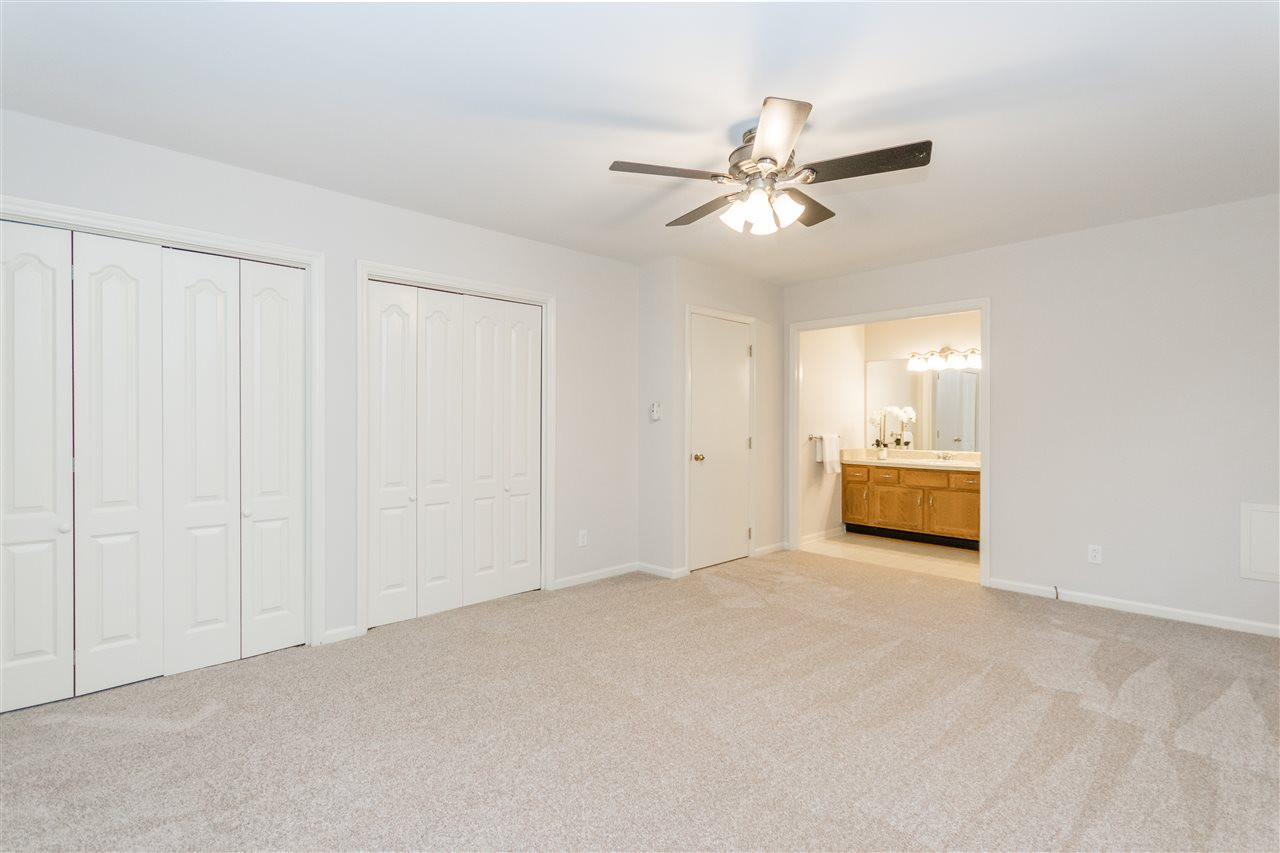 8300 Dunwood Court Raleigh, NC 27613 - Photo 14 of 18 Has two adjoining closets with a lot of storage Master Bedroom