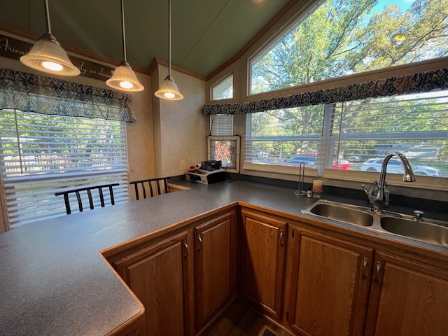 2795 East 28th Road Marseilles, IL 61341 - Photo 26 of 75 a kitchen with stainless steel appliances granite countertop a sink a stove and a wooden floor