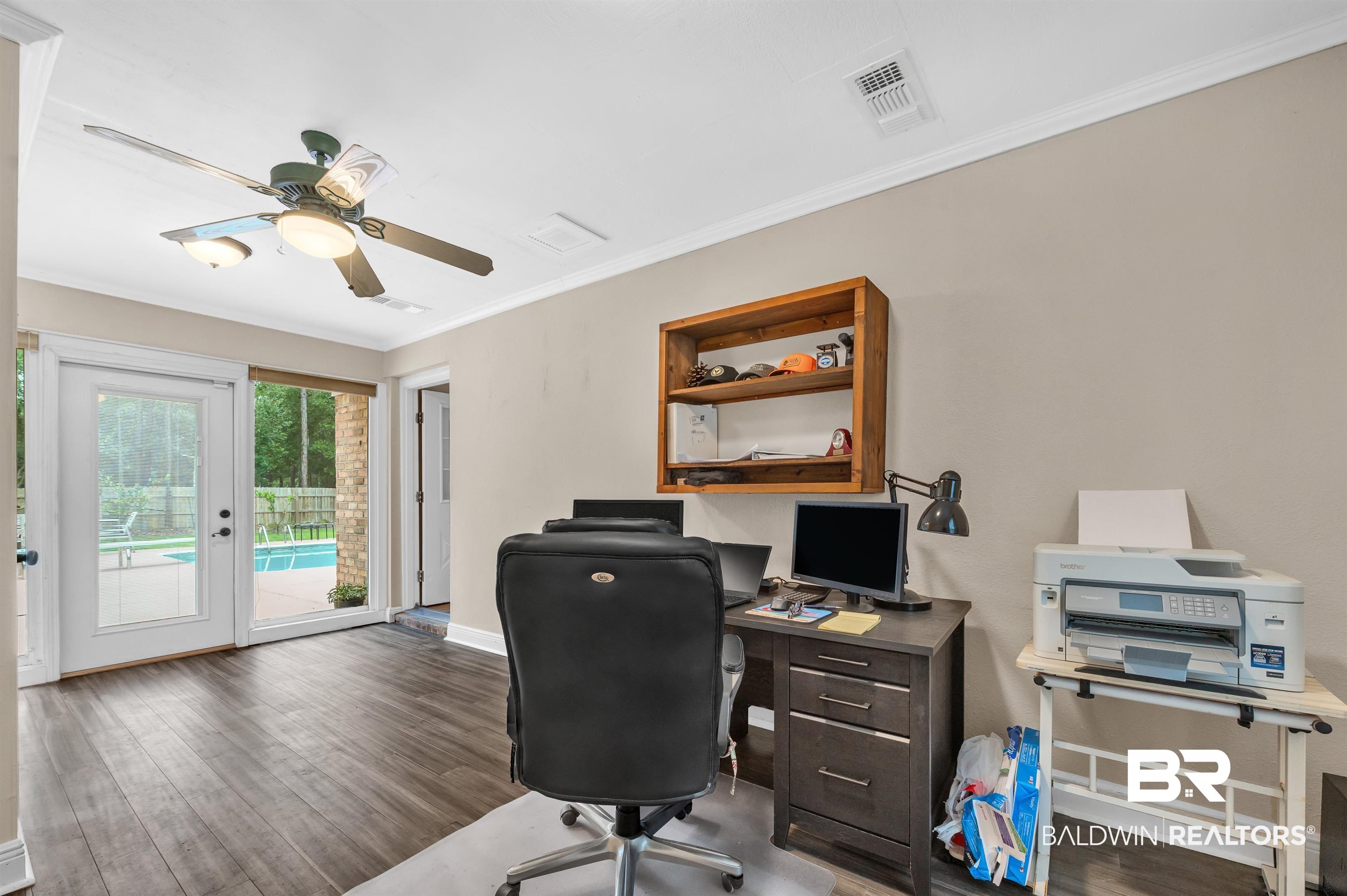 24551 Wolf Bay Drive Foley, AL 36535 - Photo 33 of 59 Office featuring wood finished floors, ornamental molding, and a ceiling fan
