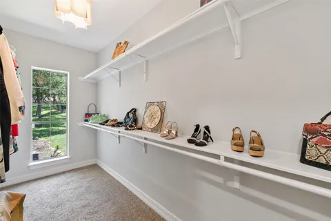 a kitchen with a refrigerator and a sink