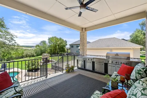 a open kitchen with stainless steel appliances granite countertop a stove and cabinets