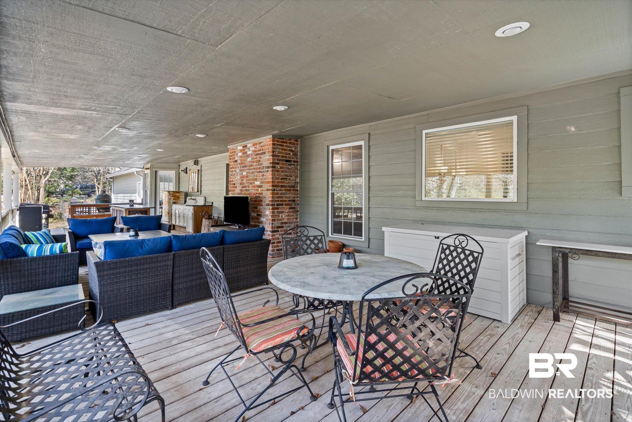 31369 Blakeley Way Daphne, AL 36527 - Photo 19 of 38 Wooden terrace with outdoor lounge area