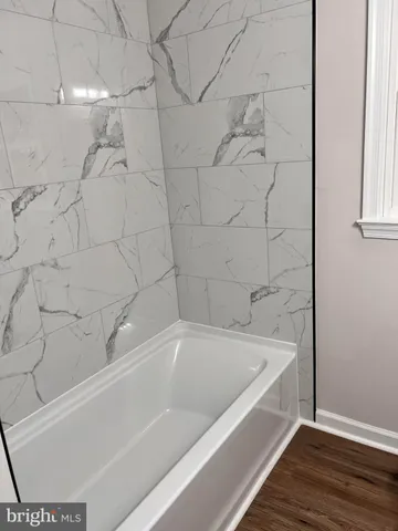 a bathroom with a bathtub