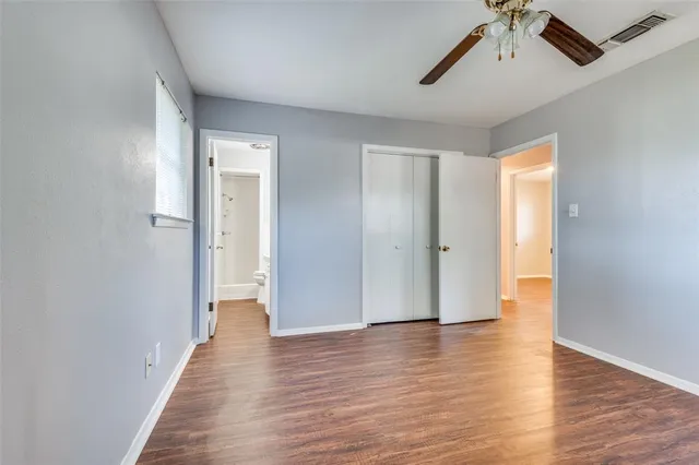 a view of a livingroom with wooden floor