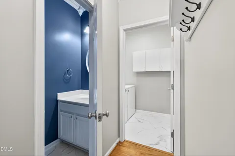 a view of a bathroom from a hallway