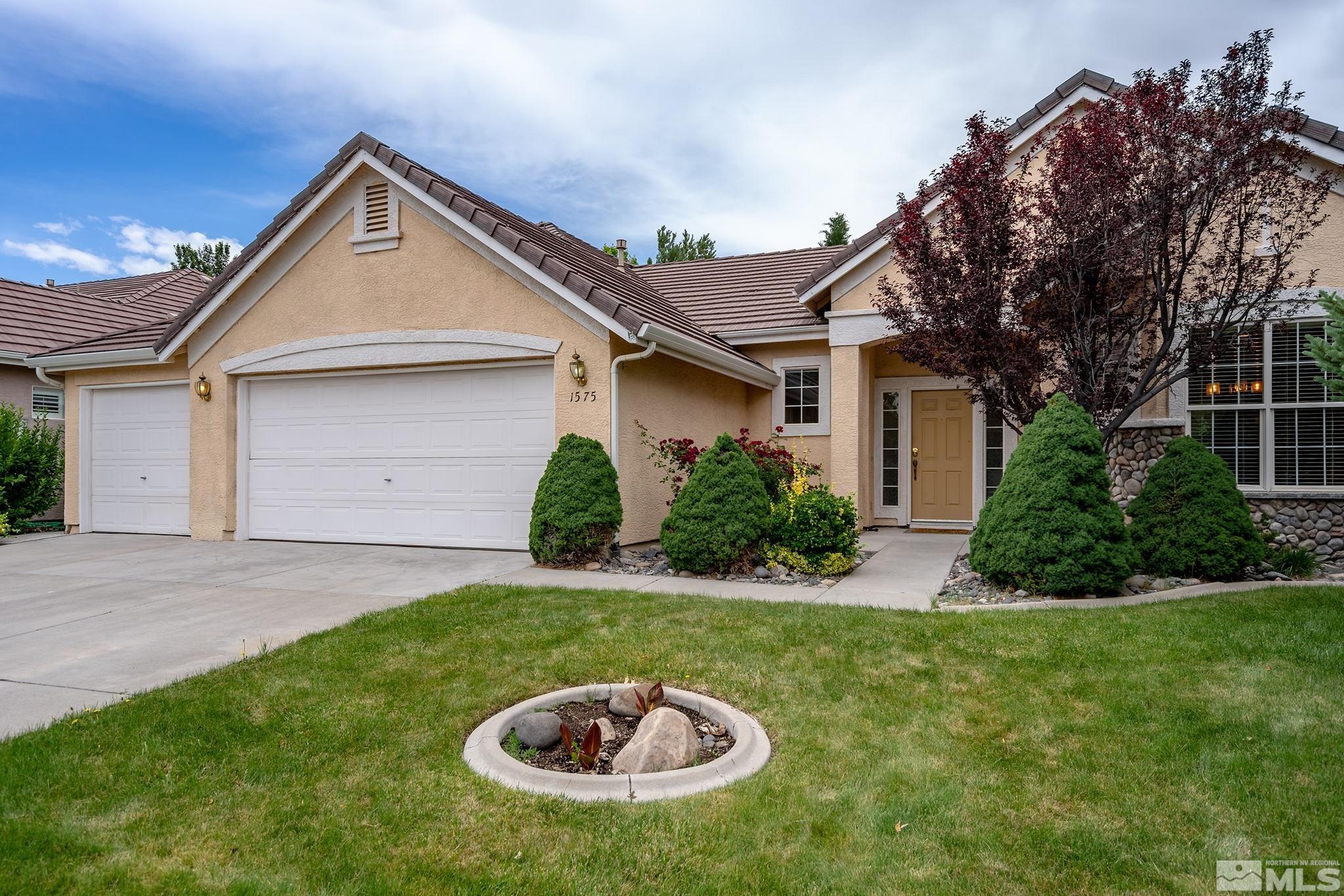 1575 Sutterbrook Way Reno, NV 89521 - Photo 1 of 21 a view of outdoor space yard and garage