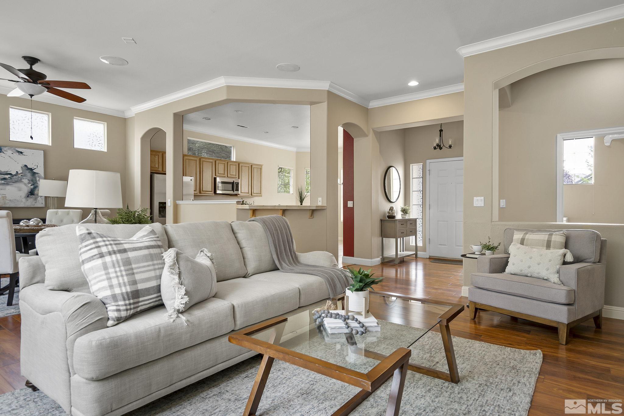 1575 Sutterbrook Way Reno, NV 89521 - Photo 6 of 21 a living room with furniture and wooden floor