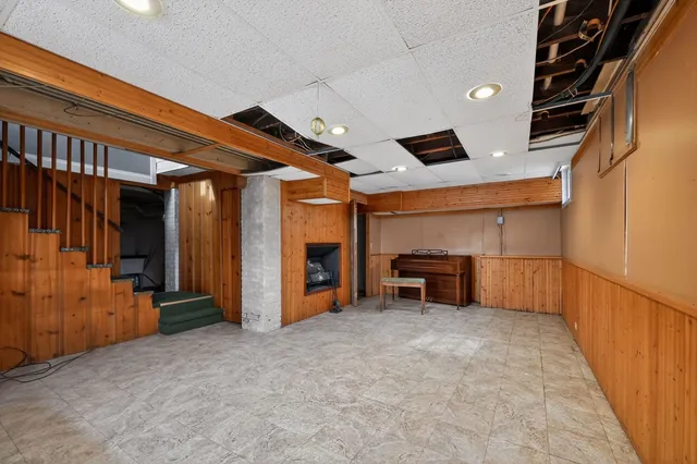 a view of a livingroom with furniture and a window