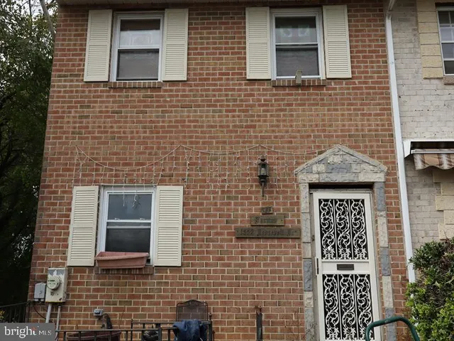 a front view of a brick house