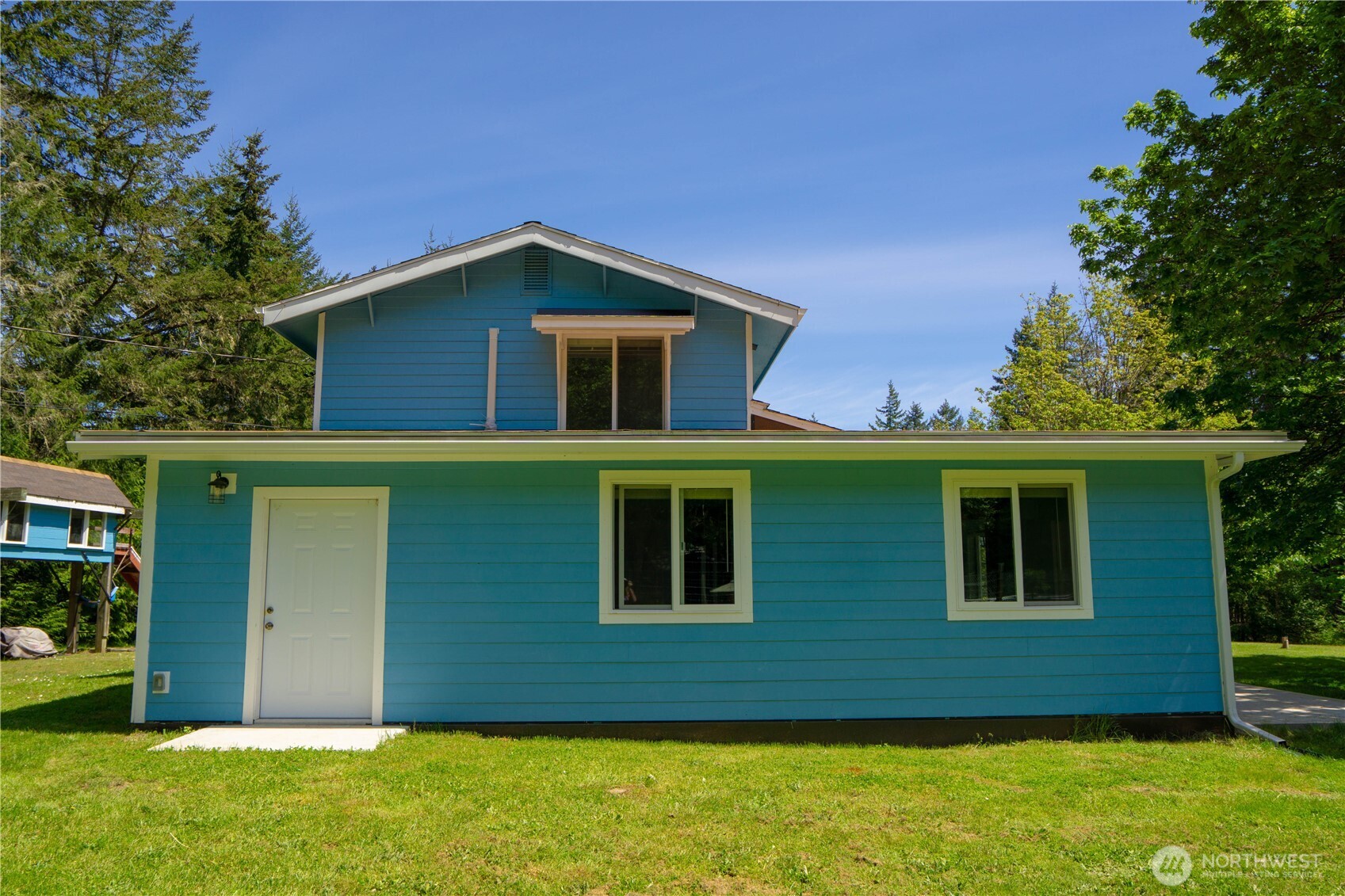 89 Slab Camp Road Sequim, WA 98382 - Photo 28 of 40 a view of front of house with a yard