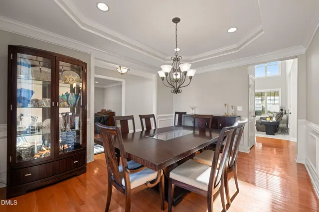 a view of a livingroom with furniture window and wooden floor