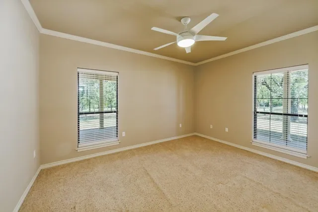 a view of outdoor space with trees all around