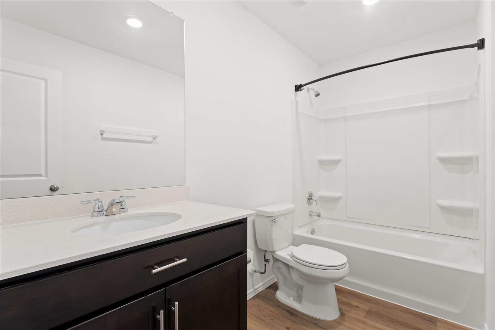 905 Powell Kyle, TX 78640 - Photo 28 of 37 a bathroom with a sink a toilet and a mirror