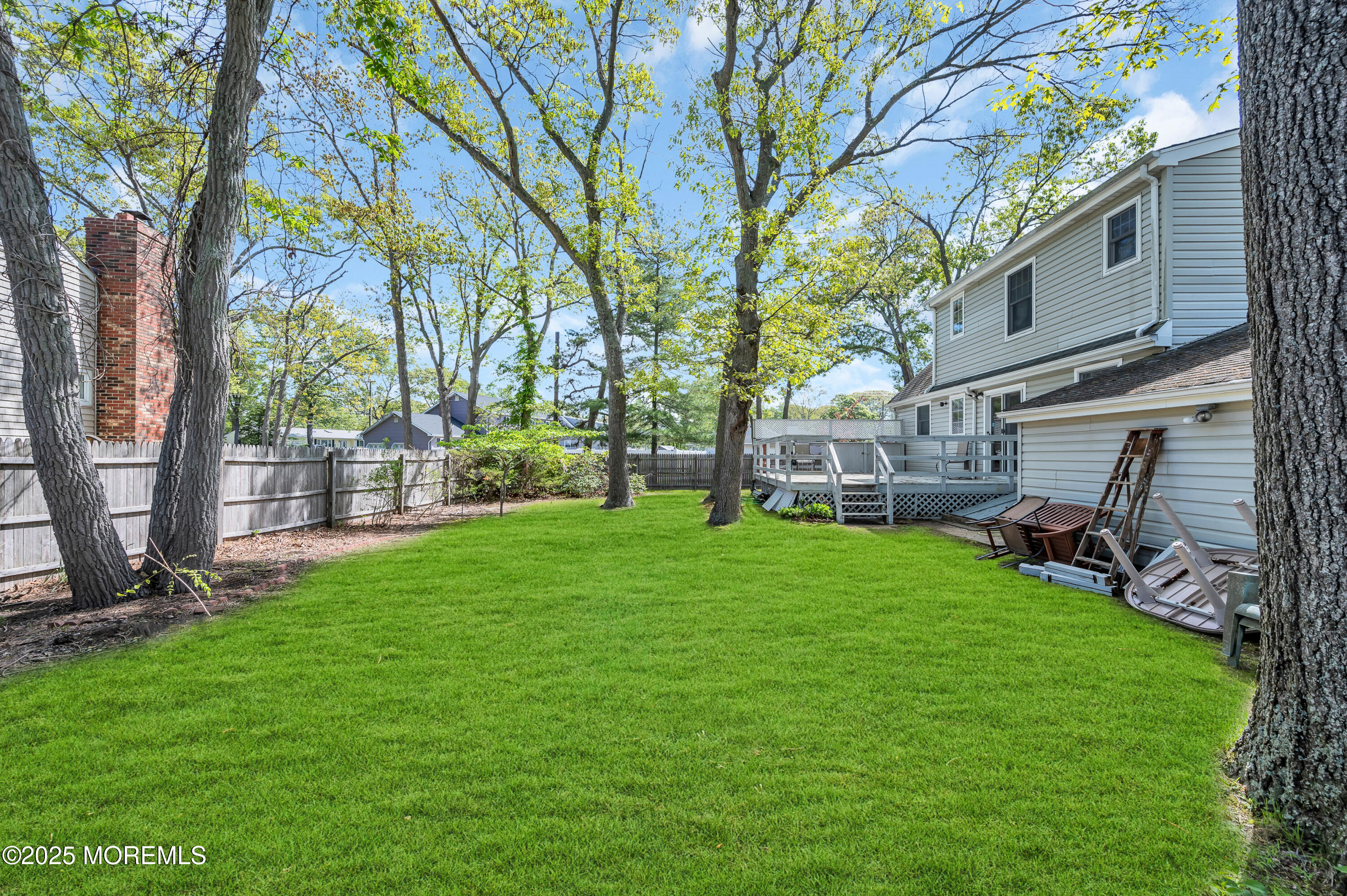 640 Thoroughfare Road Brick, NJ 08724 - Photo 31 of 48 a view of a backyard with a garden
