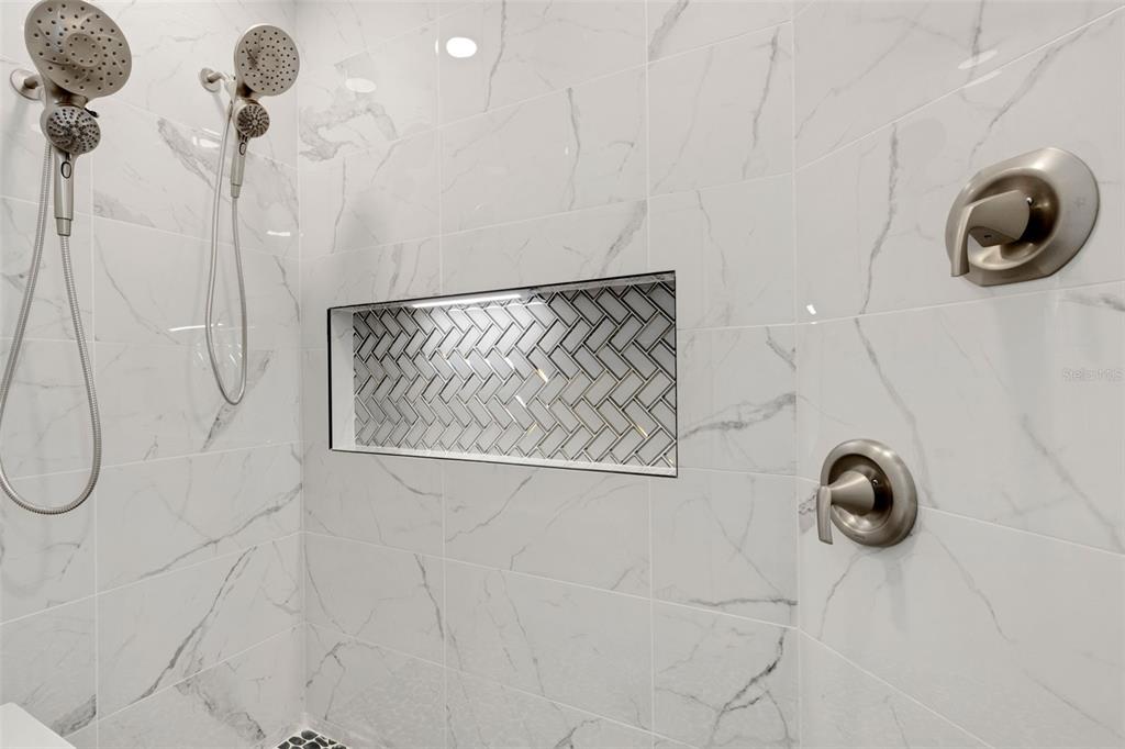 606 Marcus Street, Unit 26 Venice, FL 34285 - Photo 27 of 42 a bathroom with a shower