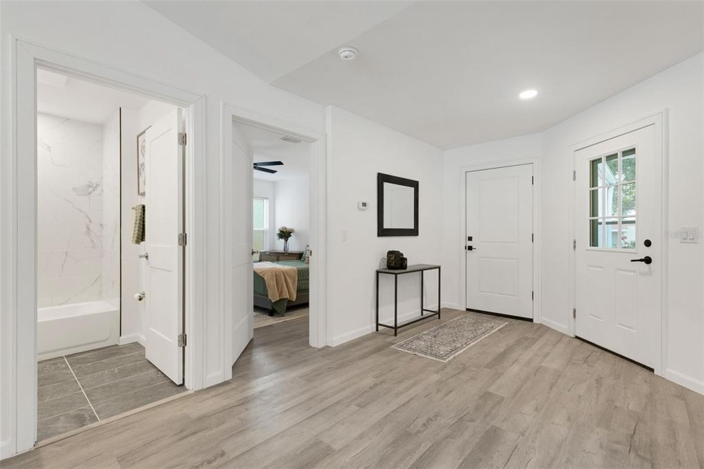 606 Marcus Street, Unit 26 Venice, FL 34285 - Photo 4 of 42 wooden floor and white doors