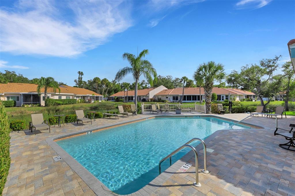 606 Marcus Street, Unit 26 Venice, FL 34285 - Photo 42 of 42 a view of a swimming pool and a terrace