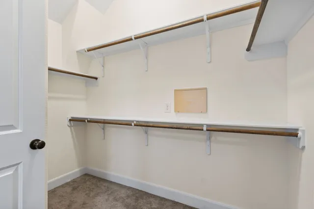 a view of a room with racks on the wall