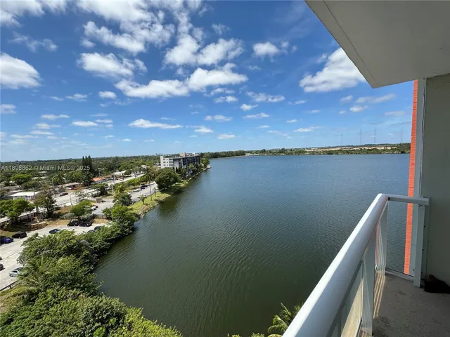a view of a lake from a balcony