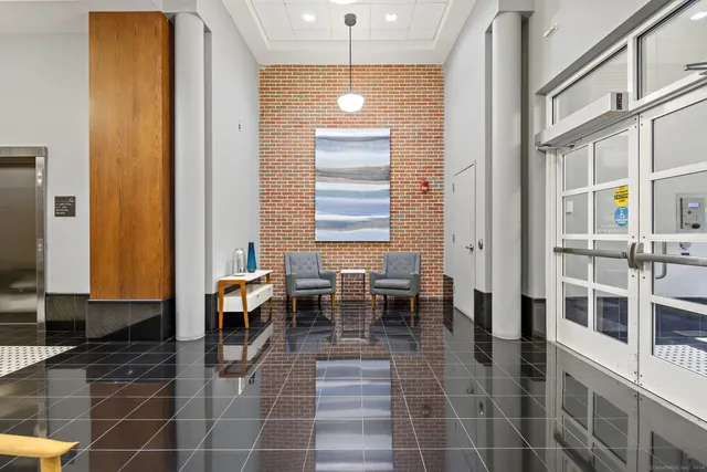 a dining room with a table and chairs