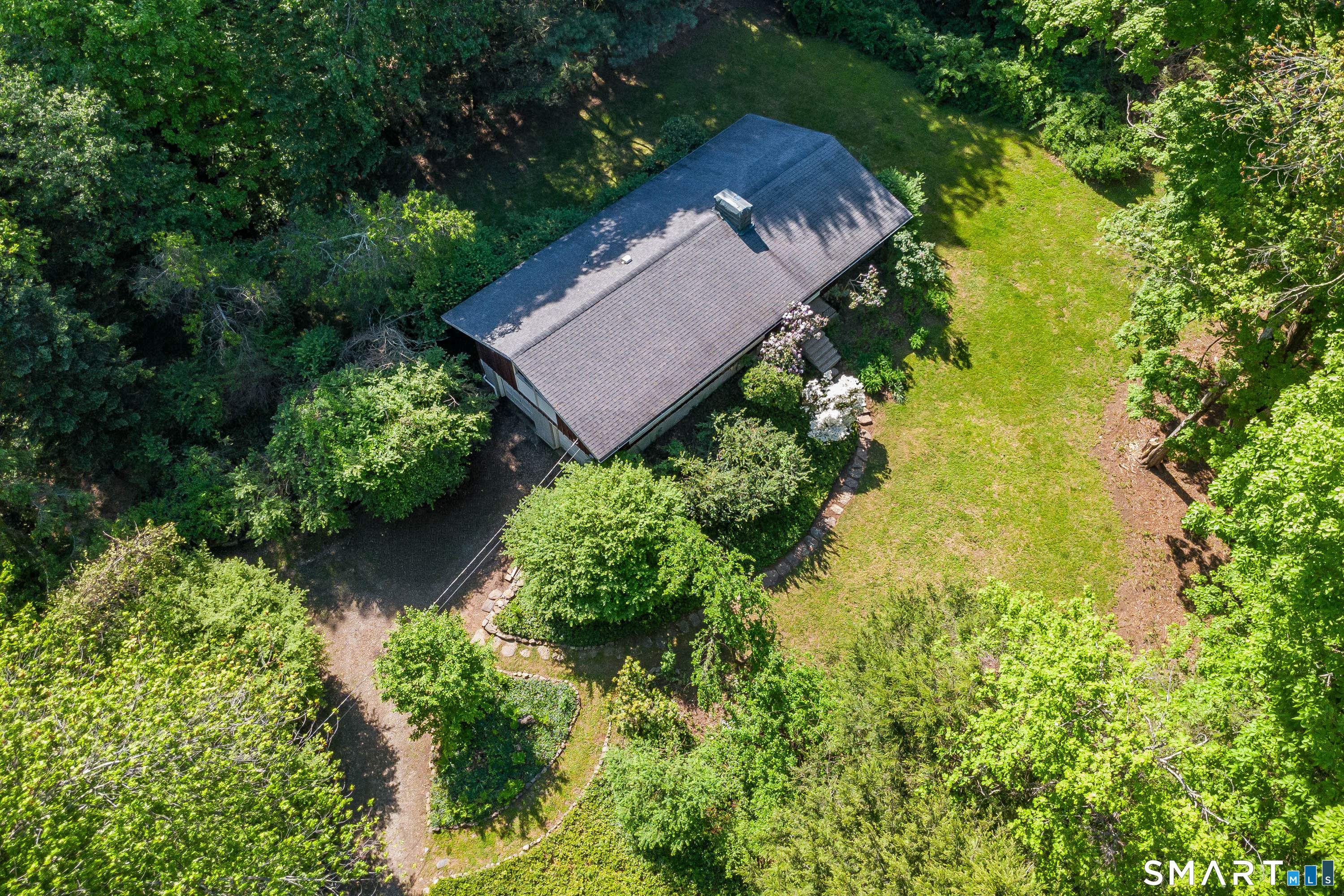 4 Pepper Pond Road Sherman, CT 06784 - Photo 27 of 33 an aerial view of a house with a yard and garden