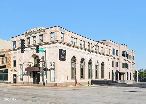 a large building with a clock on it