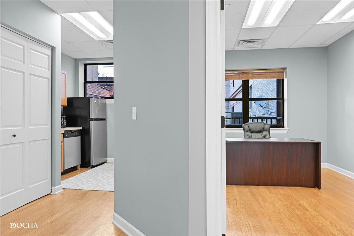 202 West Main Street, Unit 202 St. Charles, IL 60174 - Photo 11 of 17 a view of kitchen with refrigerator and window