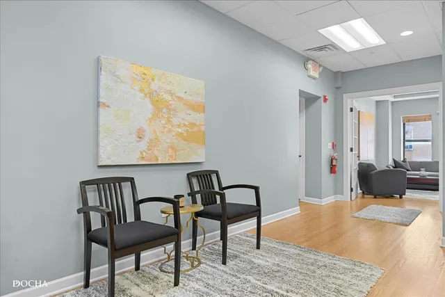 a living room with furniture and window