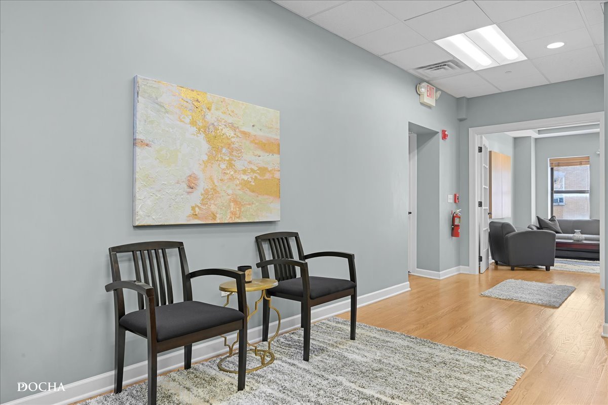 202 West Main Street, Unit 202 St. Charles, IL 60174 - Photo 3 of 17 a living room with furniture and window