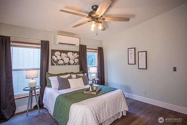 a bed room with a bed and a table