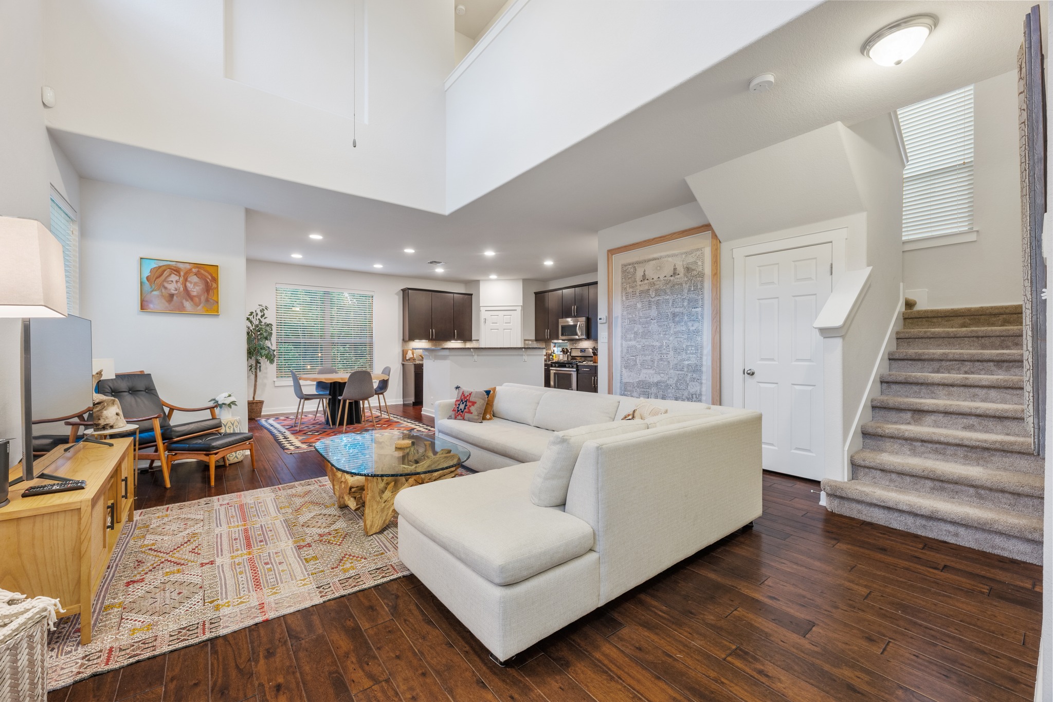 2101 Rivers Edge Way, Unit 19 Austin, TX 78741 - Photo 9 of 24 a living room with furniture and a wooden floor