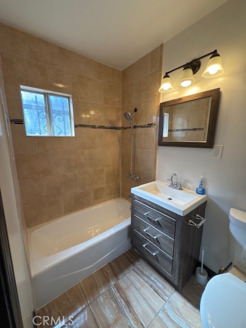 836 West Cedar Street Compton, CA 90220 - Photo 12 of 22 a bathroom with a tub sink and mirror