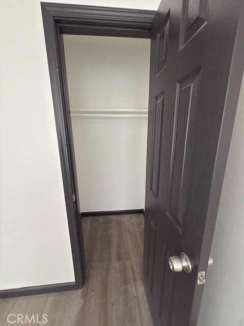 836 West Cedar Street Compton, CA 90220 - Photo 15 of 22 a view of a hallway with wooden floor
