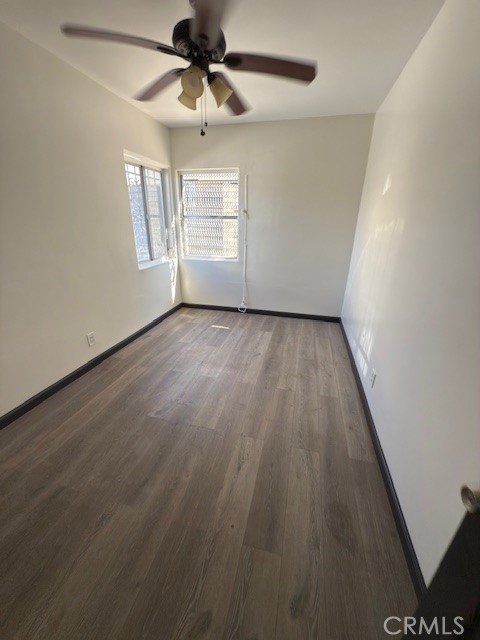 836 West Cedar Street Compton, CA 90220 - Photo 17 of 22 wooden floor in an empty room with a window