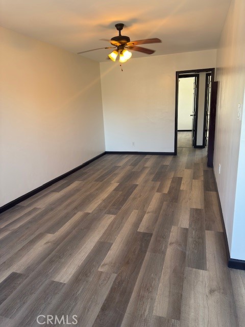 836 West Cedar Street Compton, CA 90220 - Photo 7 of 22 a view of a big room with closet and a chandelier fan