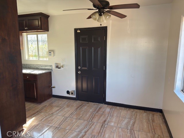 836 West Cedar Street Compton, CA 90220 - Photo 9 of 22 a view of empty room with wooden floor and window
