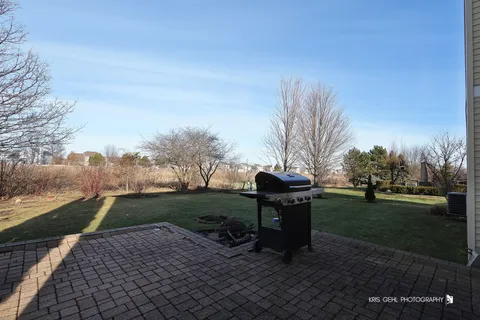 a view of backyard with outdoor space