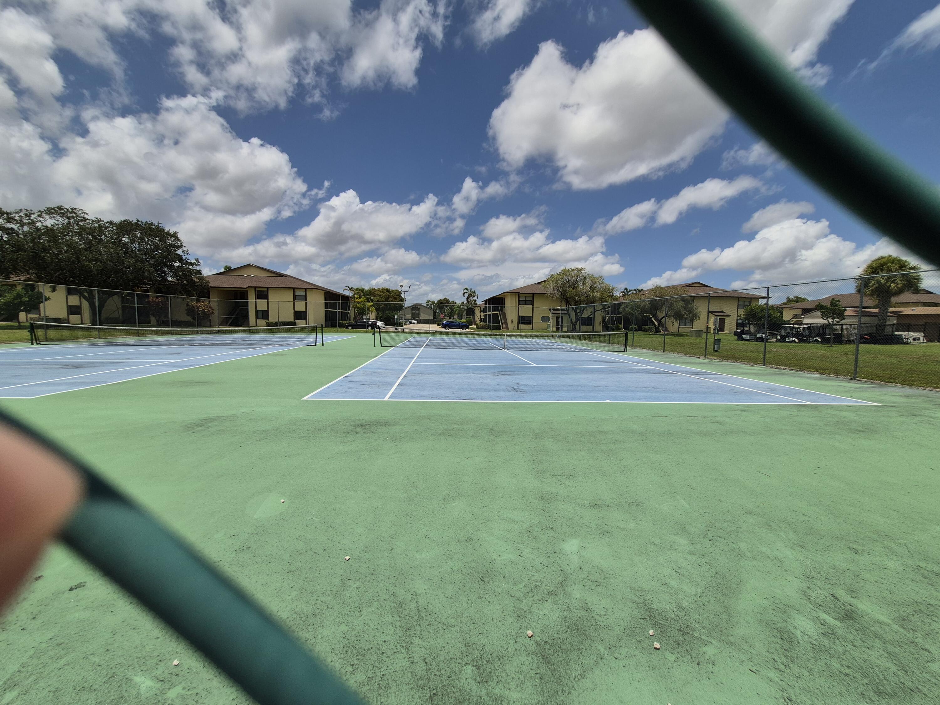 10039 Winding Lake Road, Unit 202 Sunrise, FL 33351 - Photo 14 of 14 a view of a basketball court